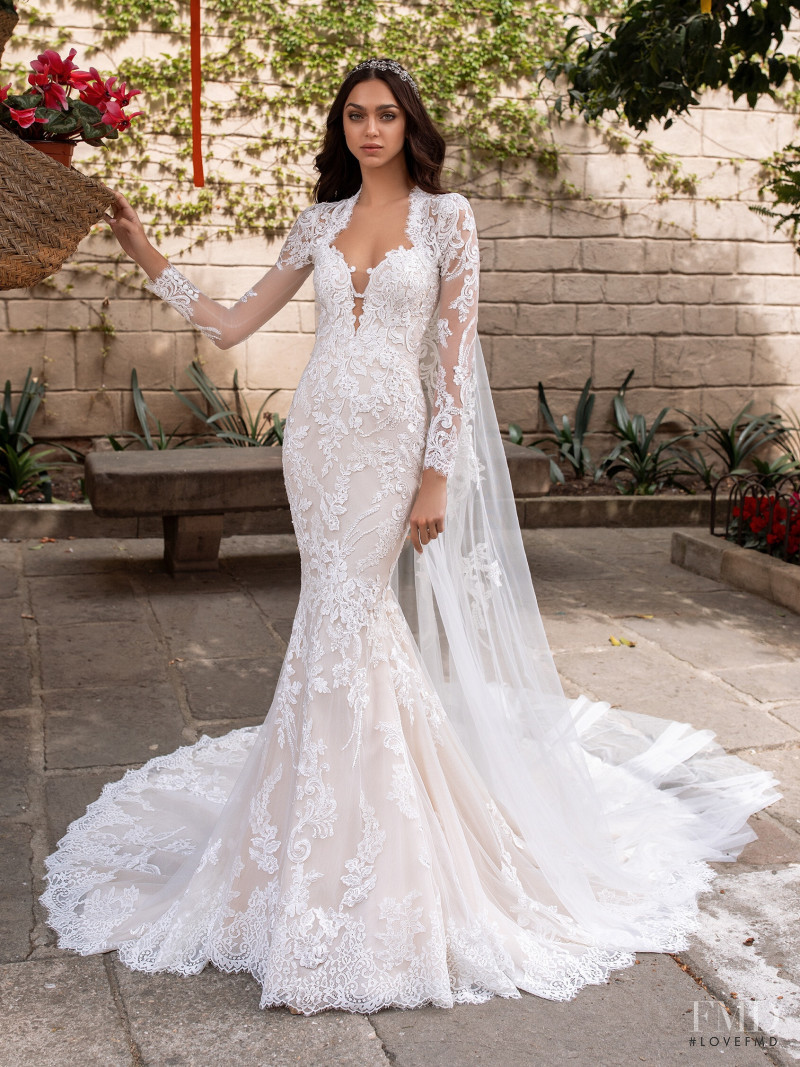 Zhenya Katava featured in  the Pronovias catalogue for Summer 2019