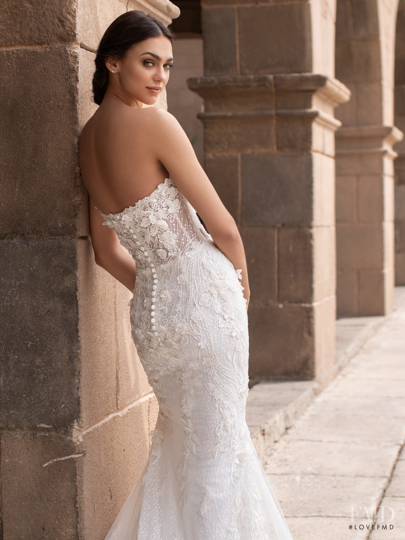 Zhenya Katava featured in  the Pronovias catalogue for Summer 2019