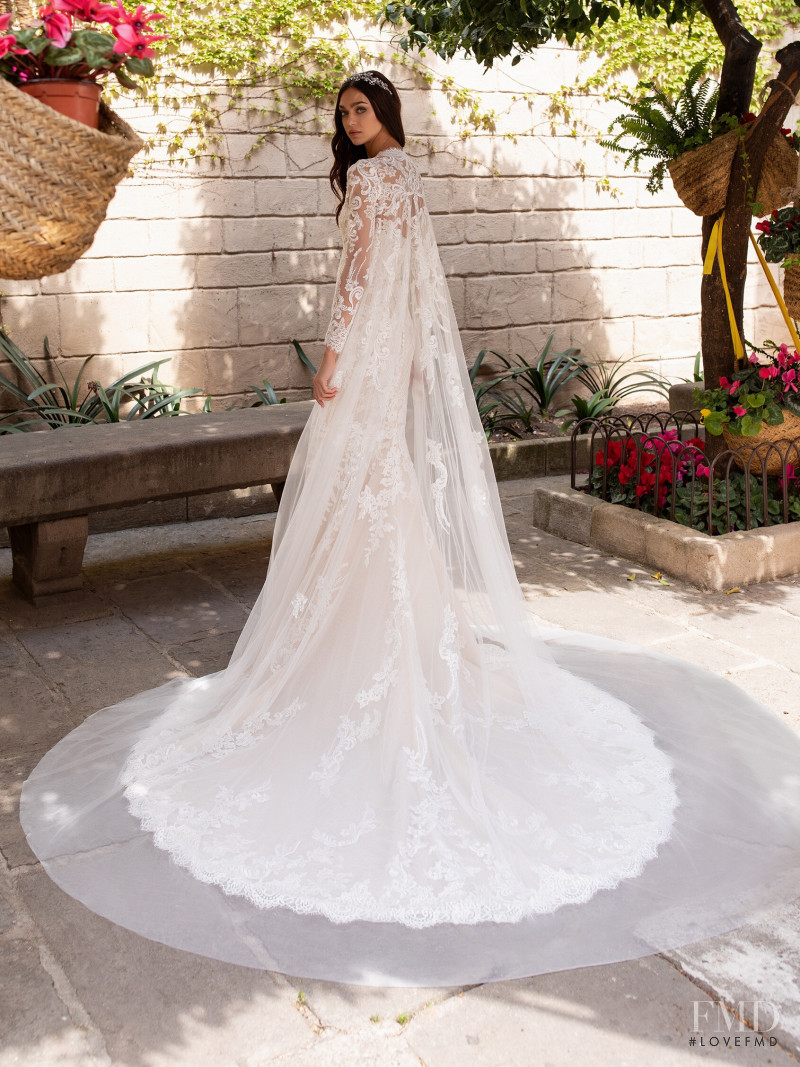 Zhenya Katava featured in  the Pronovias catalogue for Summer 2019