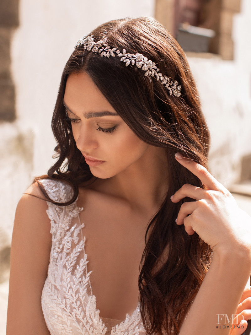 Zhenya Katava featured in  the Pronovias catalogue for Summer 2019