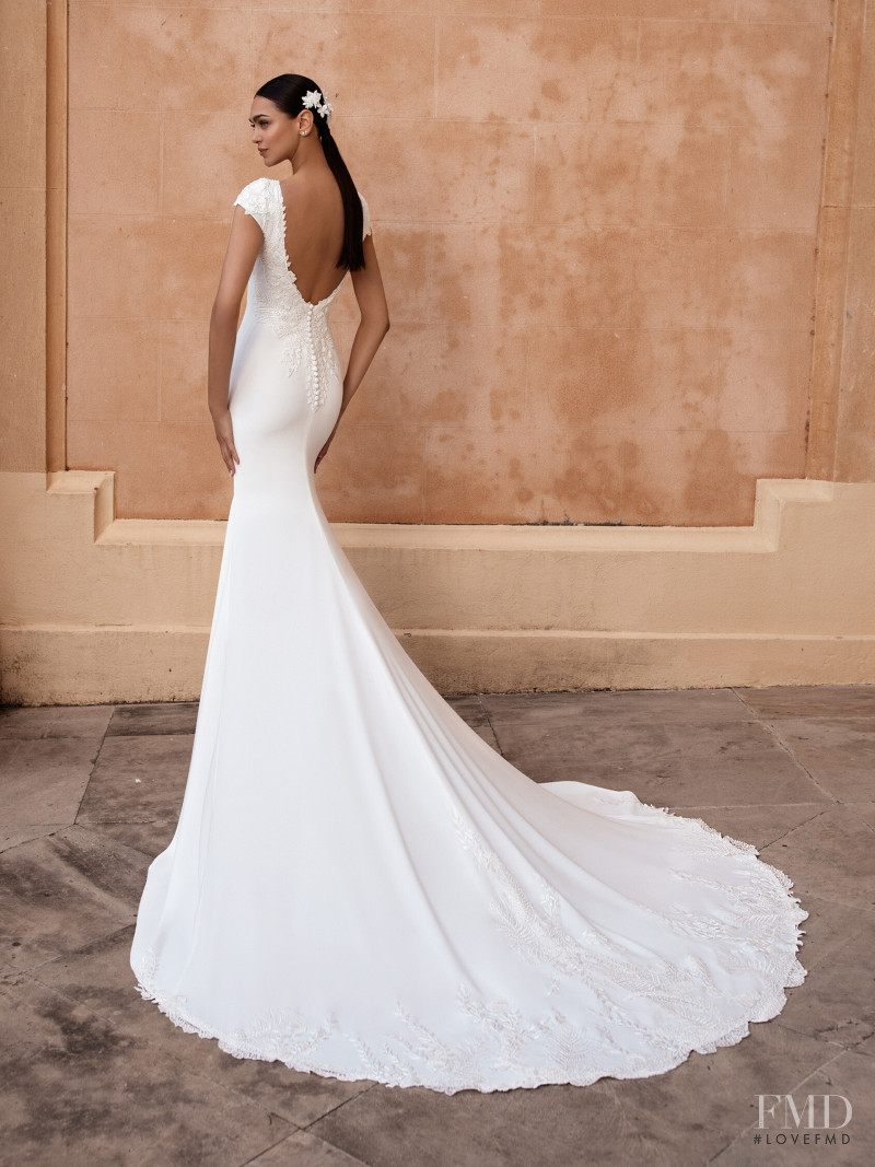 Zhenya Katava featured in  the Pronovias catalogue for Summer 2019