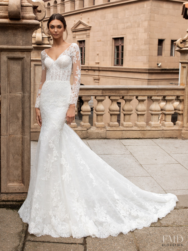 Zhenya Katava featured in  the Pronovias catalogue for Summer 2019