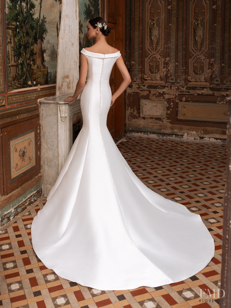 Zhenya Katava featured in  the Pronovias catalogue for Summer 2019