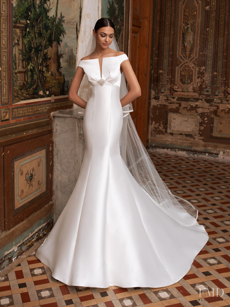 Zhenya Katava featured in  the Pronovias catalogue for Summer 2019