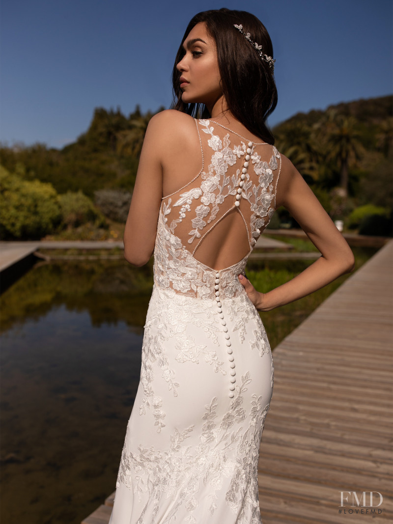 Zhenya Katava featured in  the Pronovias catalogue for Summer 2019