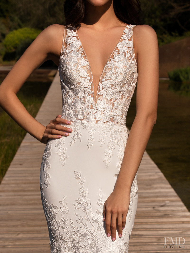 Zhenya Katava featured in  the Pronovias catalogue for Summer 2019