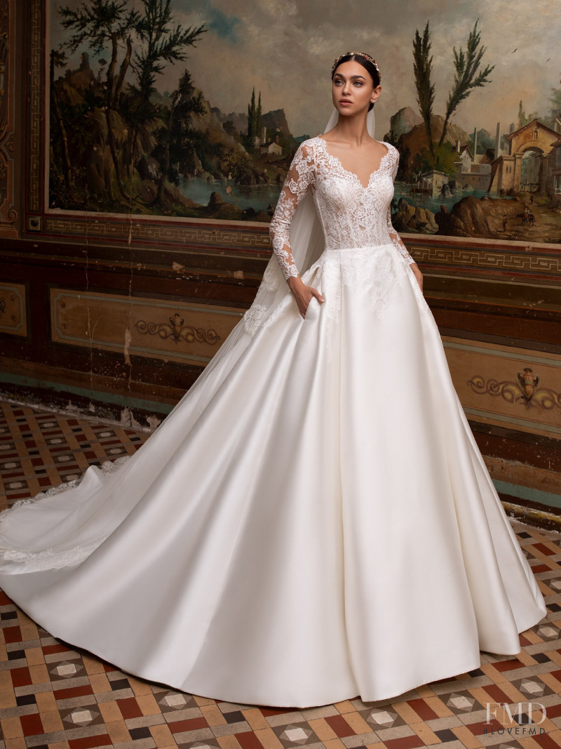 Zhenya Katava featured in  the Pronovias catalogue for Summer 2019