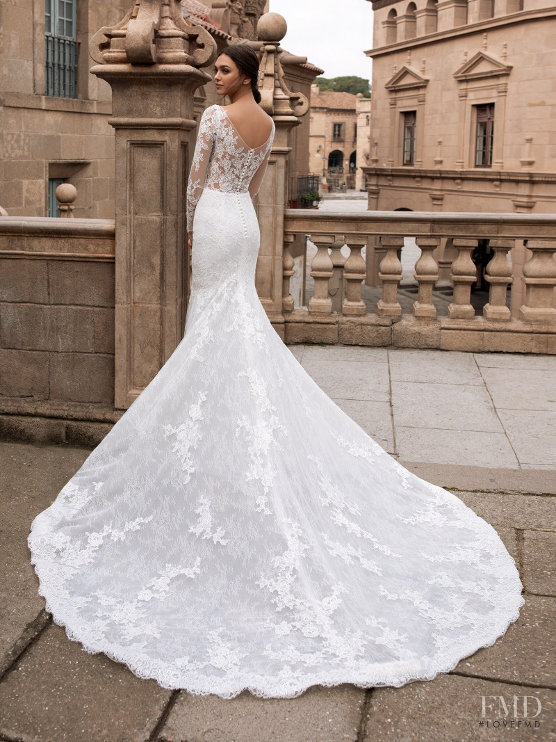 Zhenya Katava featured in  the Pronovias catalogue for Summer 2019