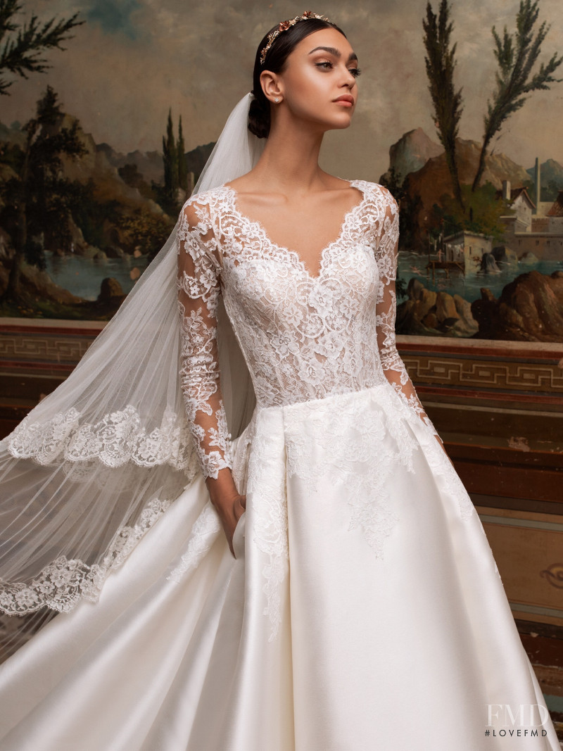 Zhenya Katava featured in  the Pronovias catalogue for Summer 2019