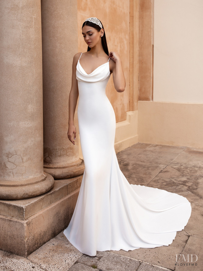 Zhenya Katava featured in  the Pronovias catalogue for Summer 2019