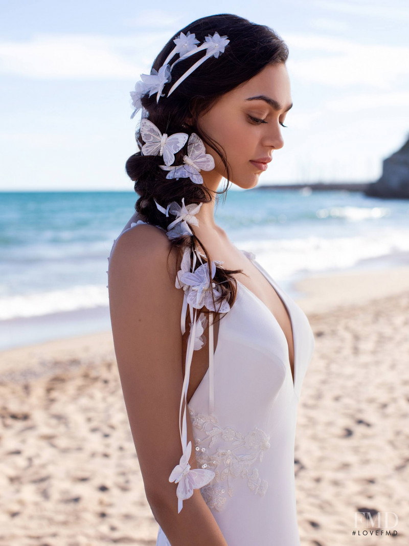 Zhenya Katava featured in  the Pronovias catalogue for Summer 2019