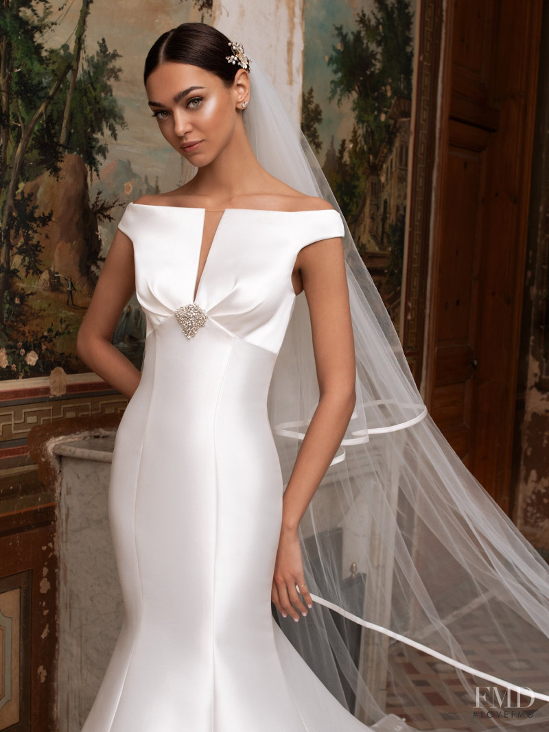 Zhenya Katava featured in  the Pronovias catalogue for Summer 2019