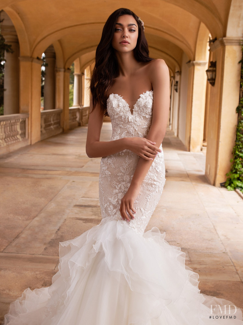 Zhenya Katava featured in  the Pronovias catalogue for Summer 2019