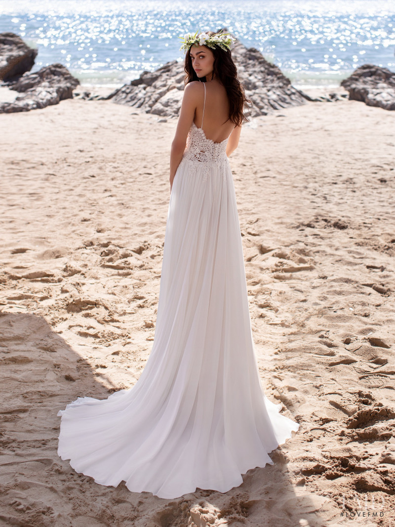 Zhenya Katava featured in  the Pronovias catalogue for Summer 2019