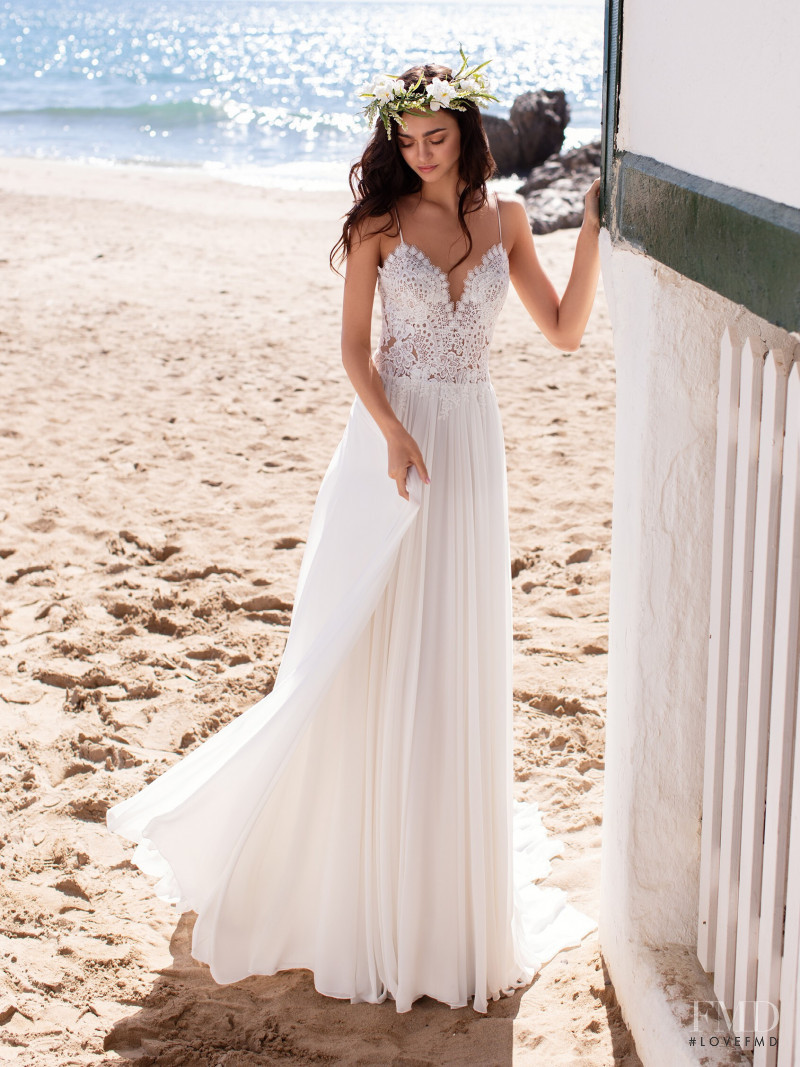 Zhenya Katava featured in  the Pronovias catalogue for Summer 2019