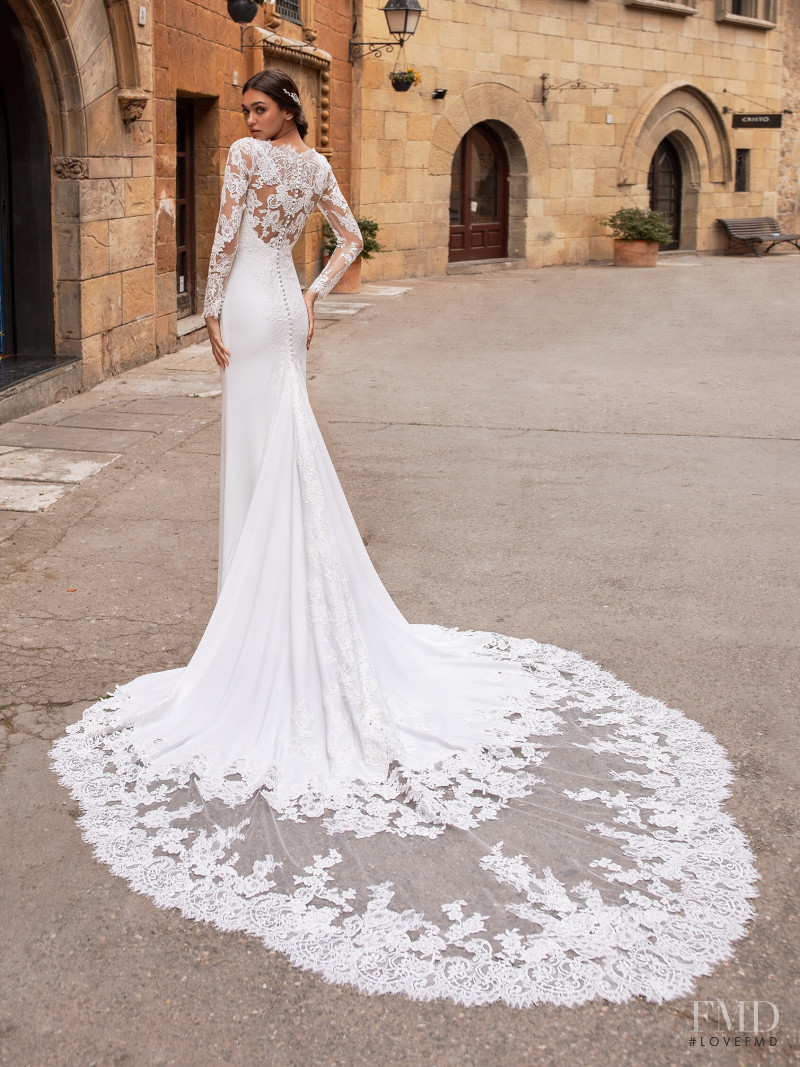 Zhenya Katava featured in  the Pronovias catalogue for Summer 2019