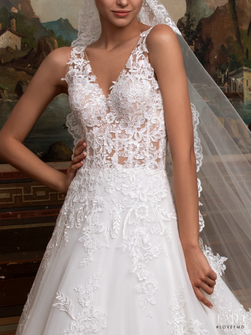 Zhenya Katava featured in  the Pronovias catalogue for Summer 2019