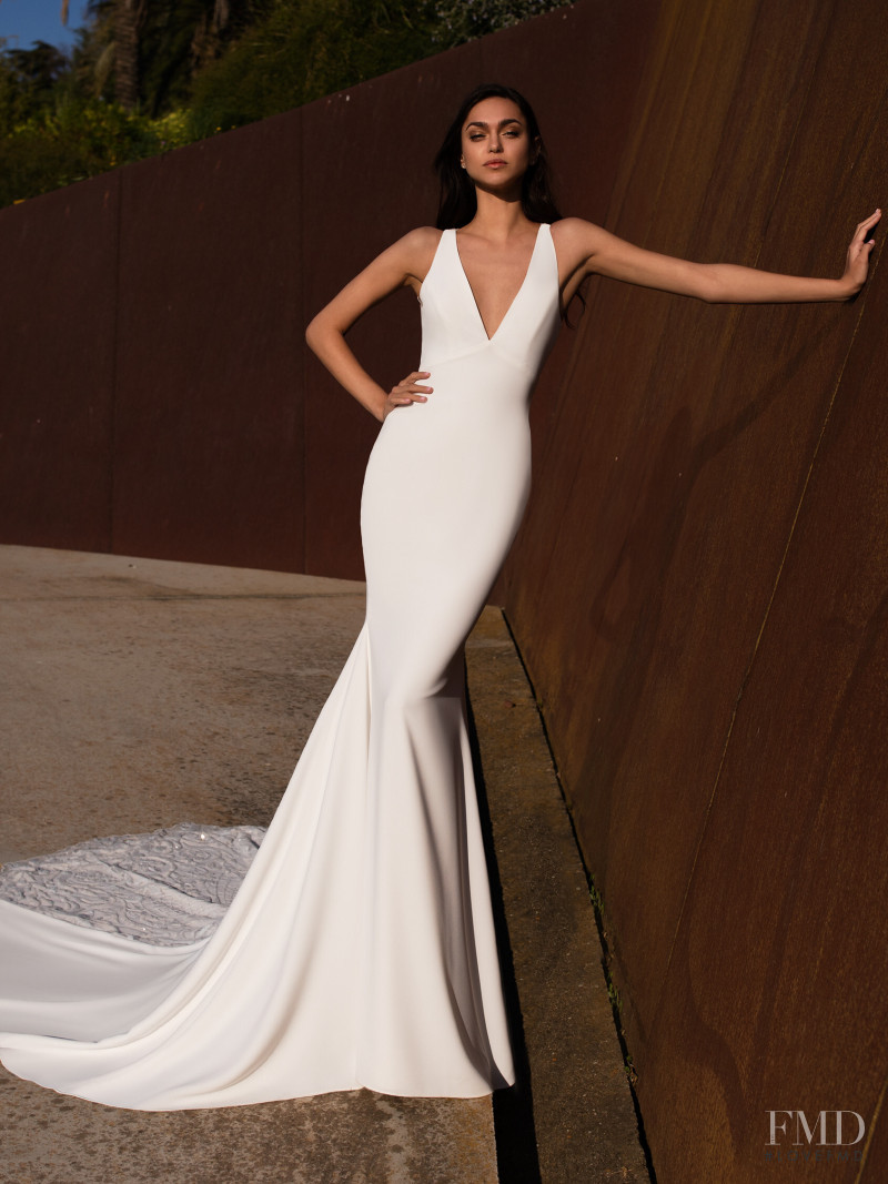 Zhenya Katava featured in  the Pronovias catalogue for Summer 2019