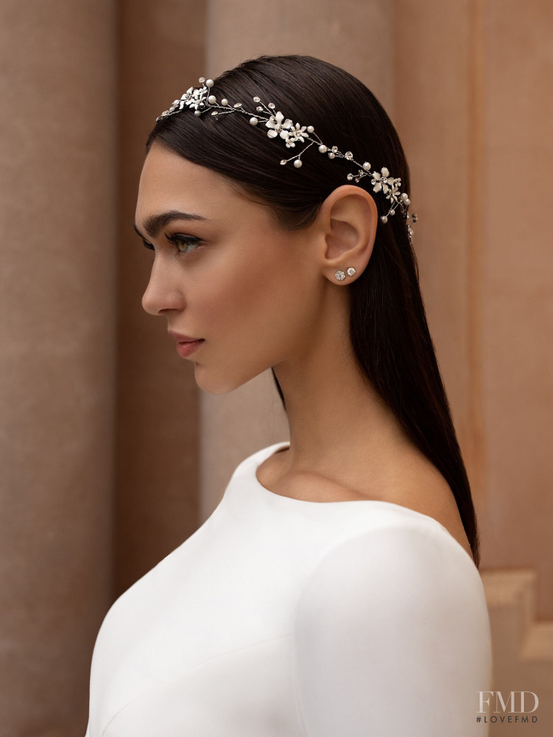 Zhenya Katava featured in  the Pronovias catalogue for Summer 2019