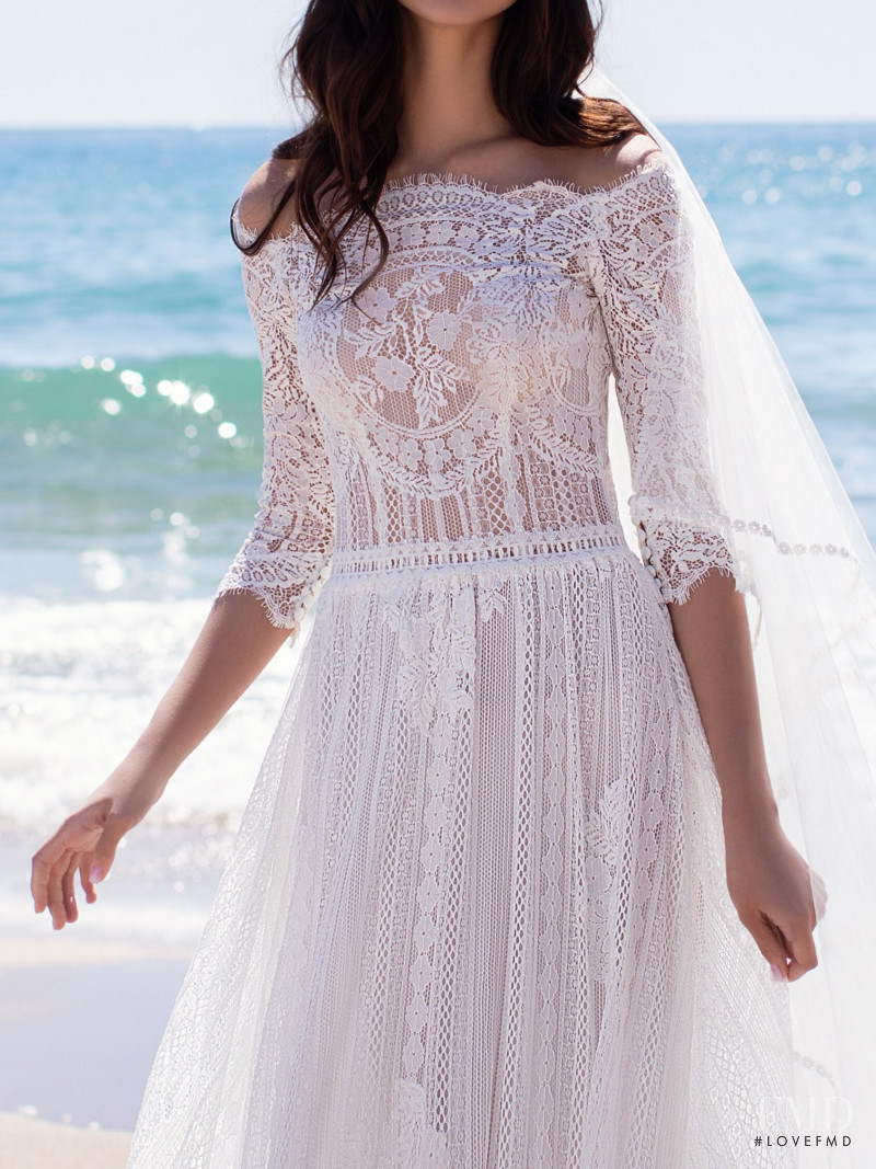 Zhenya Katava featured in  the Pronovias catalogue for Summer 2019