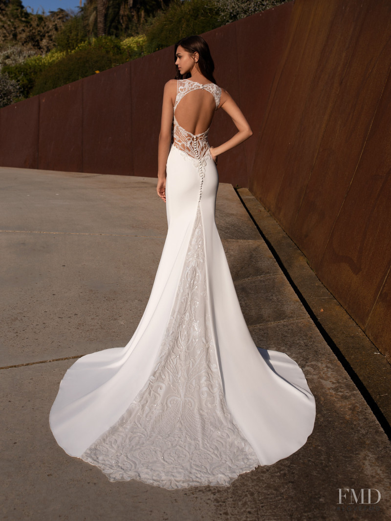 Zhenya Katava featured in  the Pronovias catalogue for Summer 2019