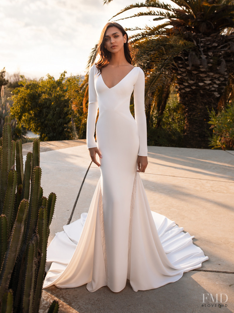 Zhenya Katava featured in  the Pronovias catalogue for Summer 2019