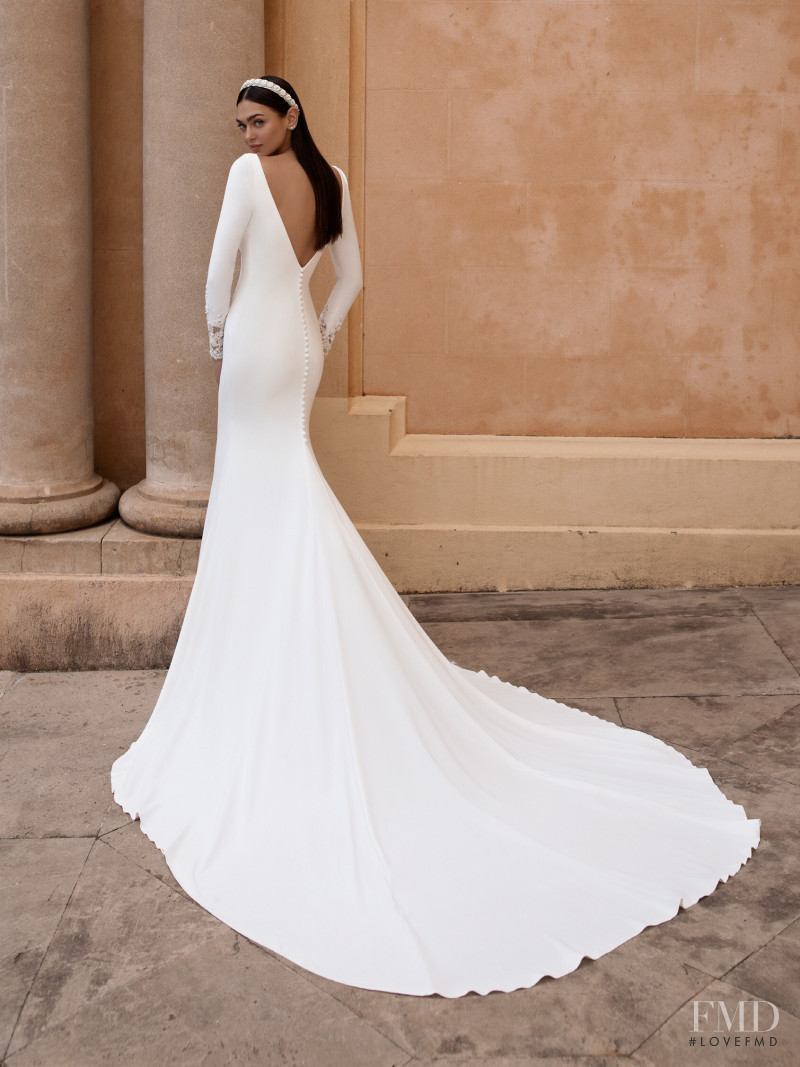 Zhenya Katava featured in  the Pronovias catalogue for Summer 2019