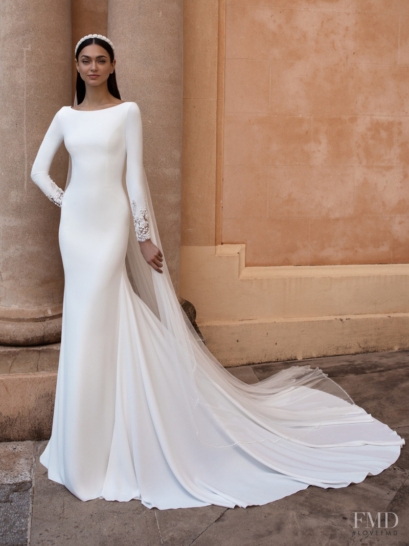 Zhenya Katava featured in  the Pronovias catalogue for Summer 2019