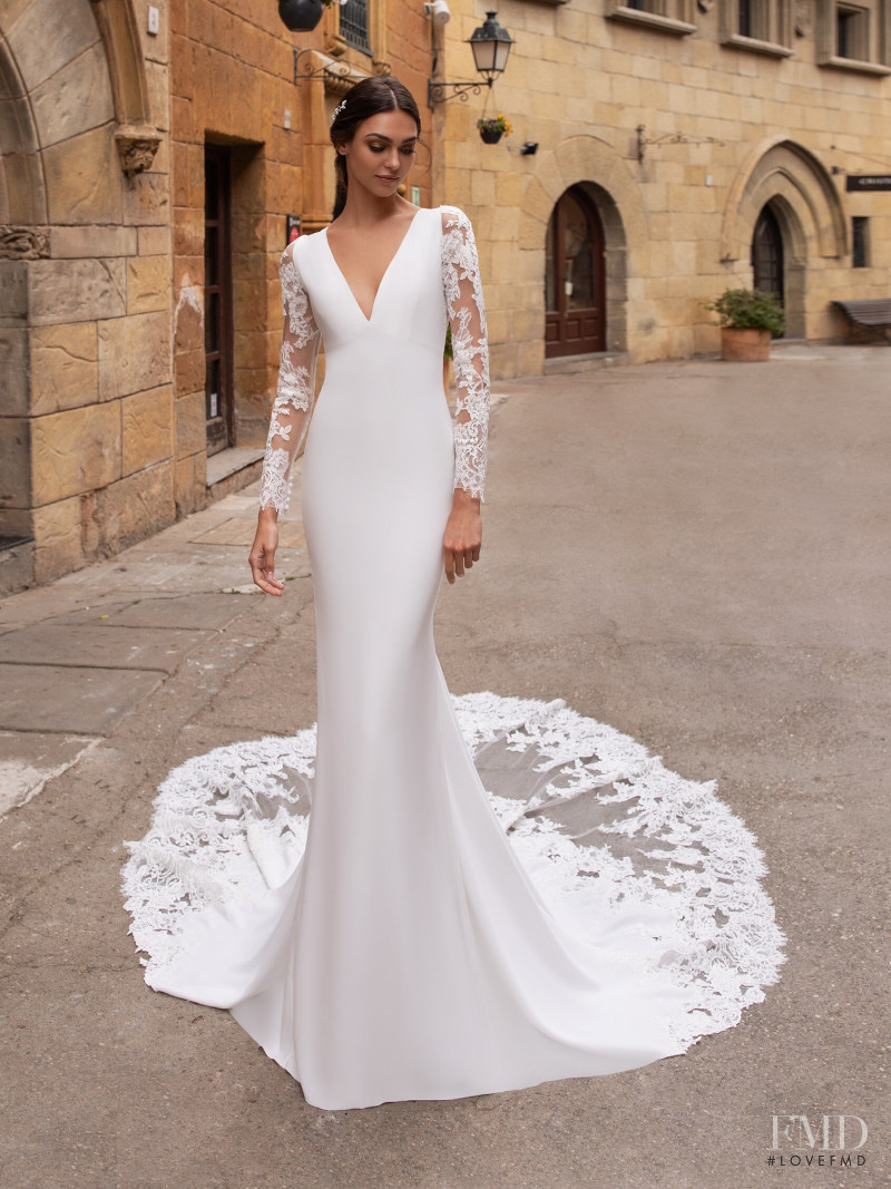 Zhenya Katava featured in  the Pronovias catalogue for Summer 2019