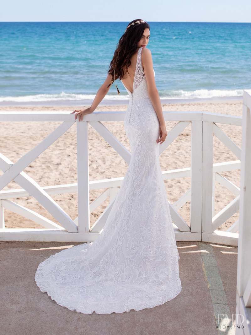 Zhenya Katava featured in  the Pronovias catalogue for Summer 2019