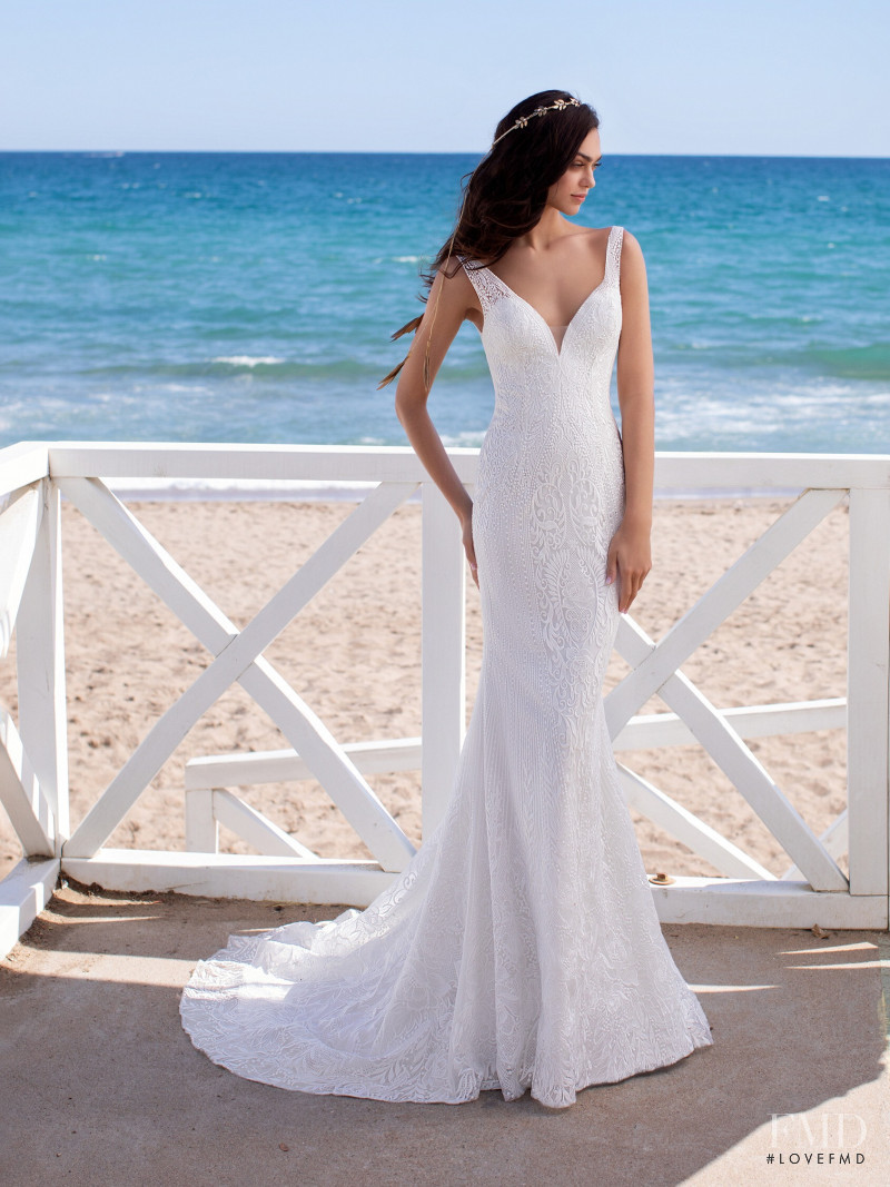 Zhenya Katava featured in  the Pronovias catalogue for Summer 2019