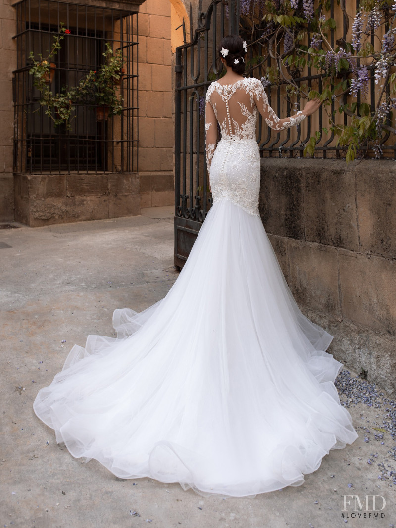 Zhenya Katava featured in  the Pronovias catalogue for Summer 2019