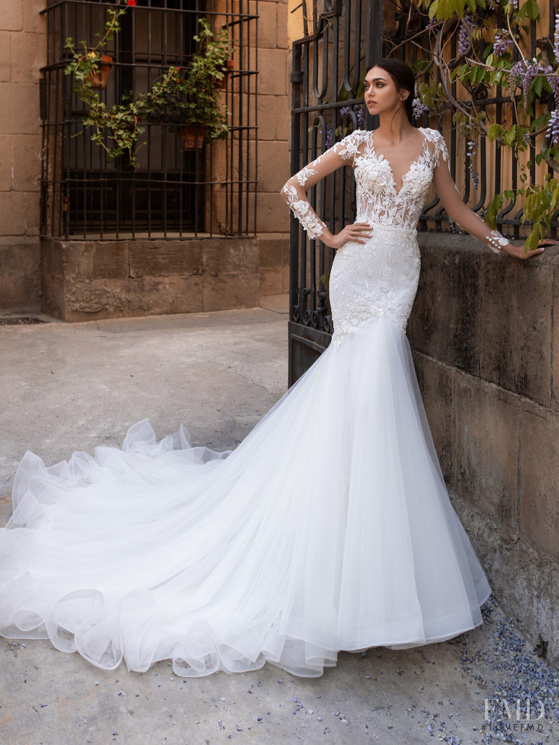 Zhenya Katava featured in  the Pronovias catalogue for Summer 2019