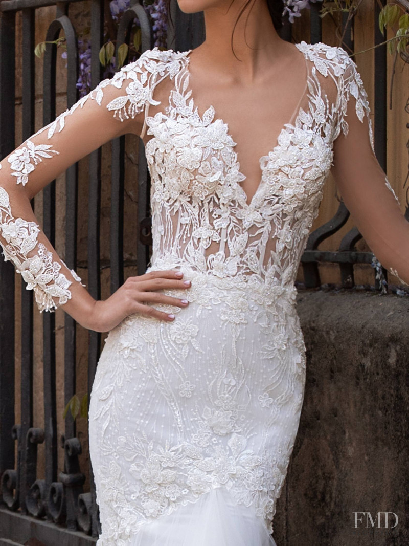 Zhenya Katava featured in  the Pronovias catalogue for Summer 2019