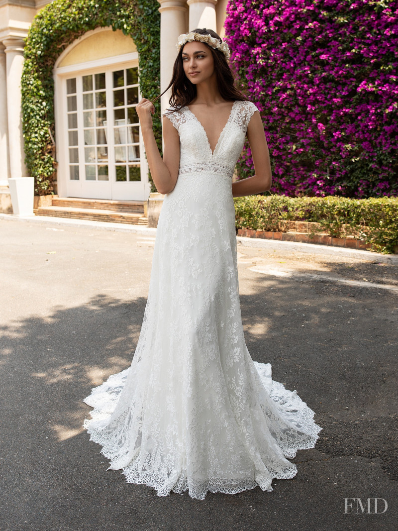 Zhenya Katava featured in  the Pronovias catalogue for Summer 2019