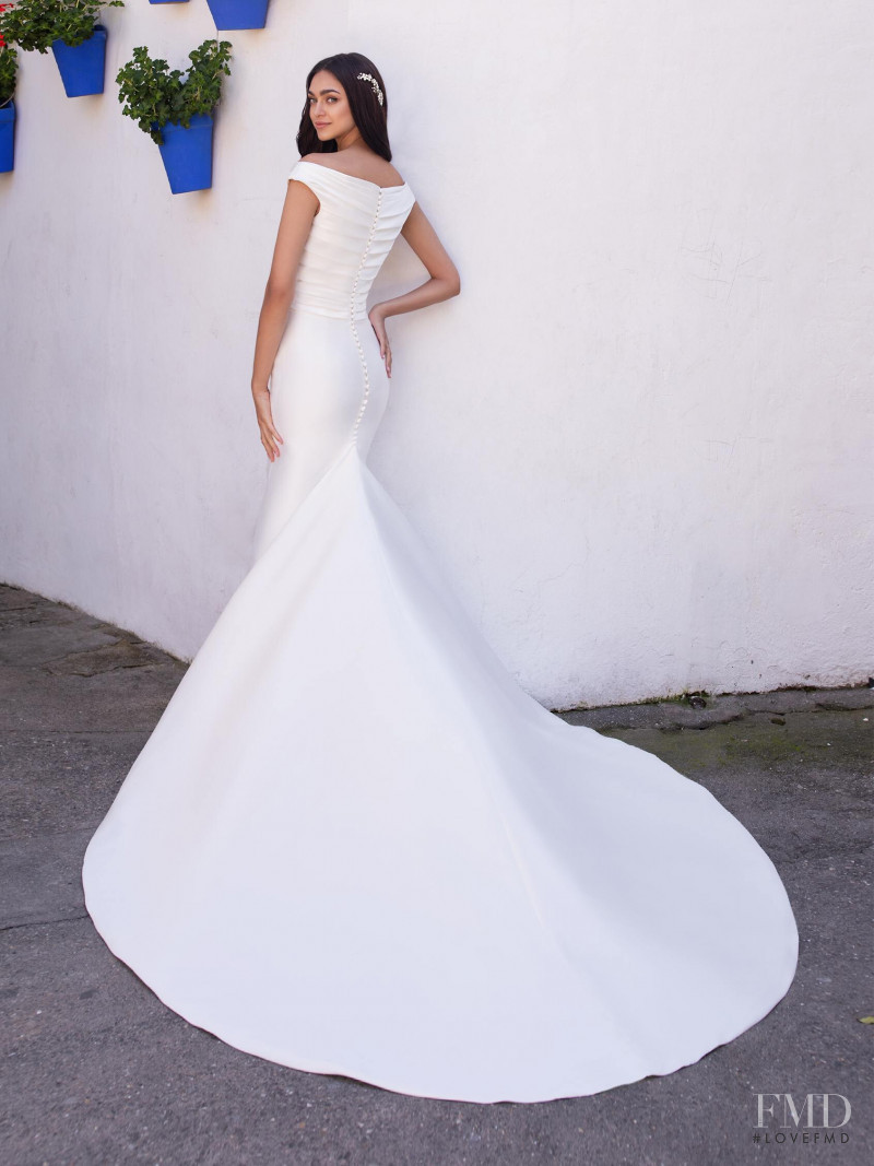 Zhenya Katava featured in  the Pronovias catalogue for Summer 2019