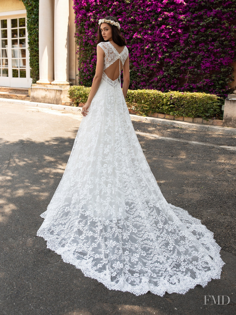 Zhenya Katava featured in  the Pronovias catalogue for Summer 2019