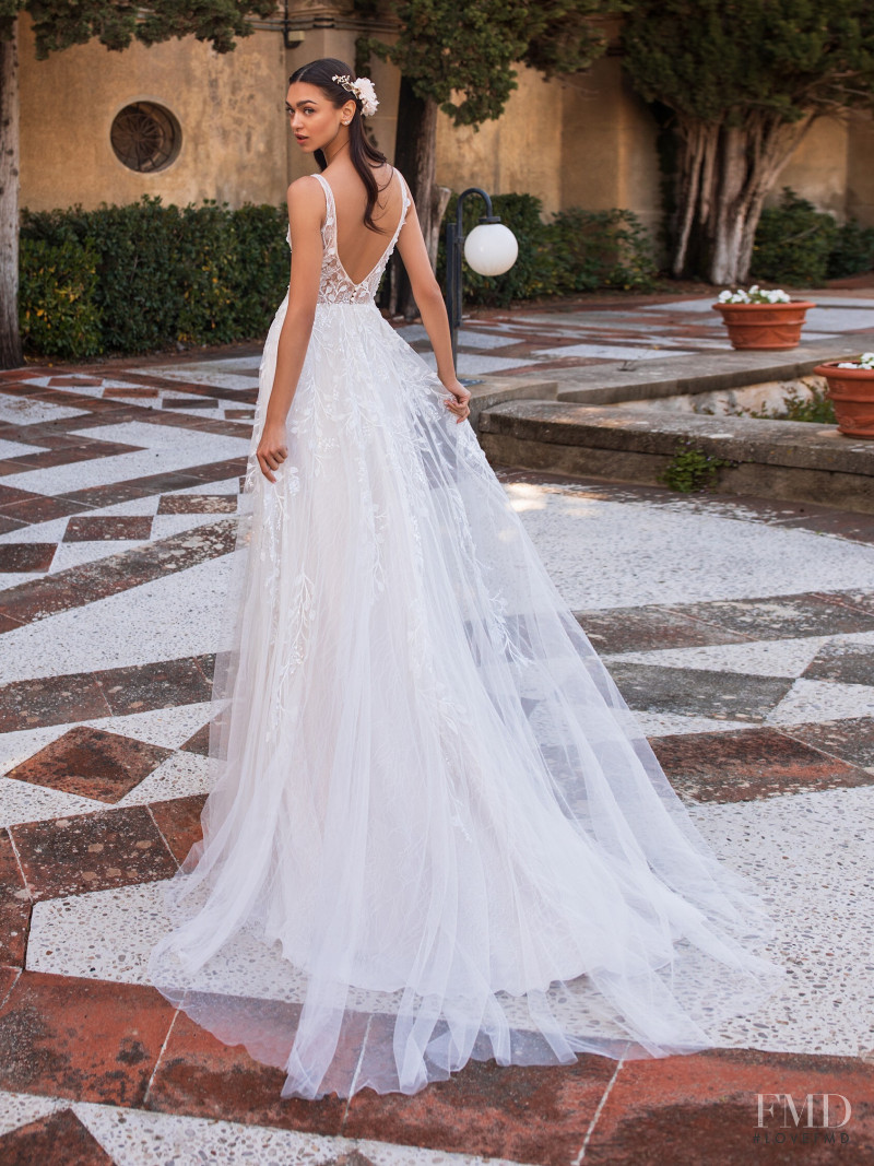 Zhenya Katava featured in  the Pronovias catalogue for Summer 2019