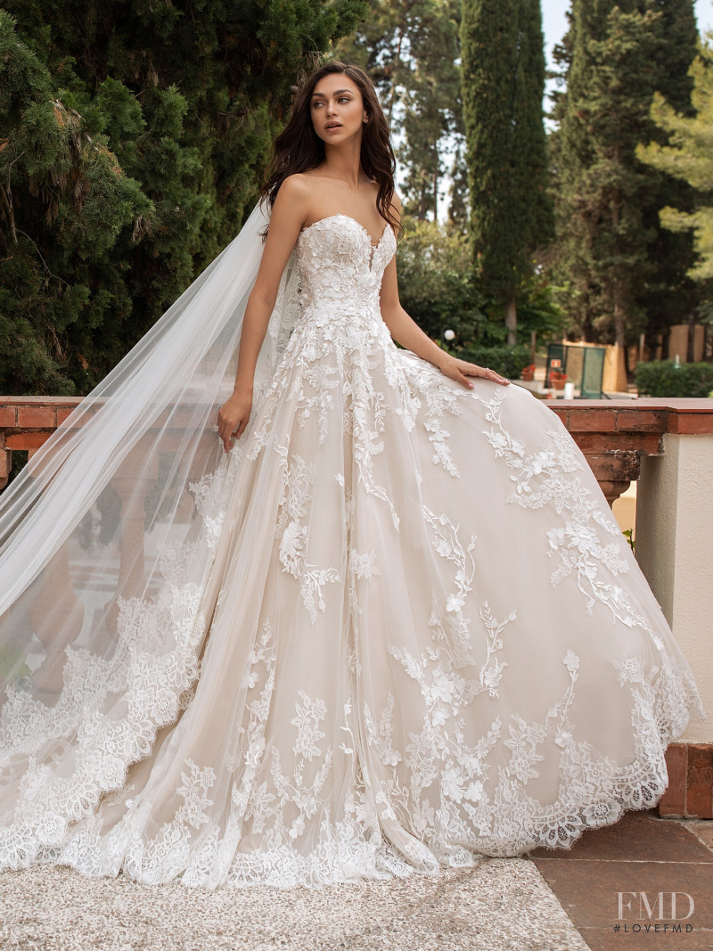 Zhenya Katava featured in  the Pronovias catalogue for Summer 2019