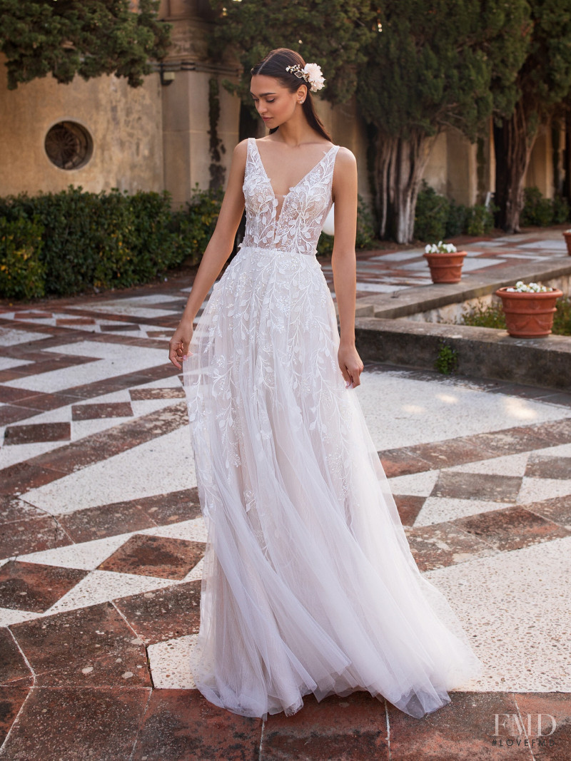 Zhenya Katava featured in  the Pronovias catalogue for Summer 2019