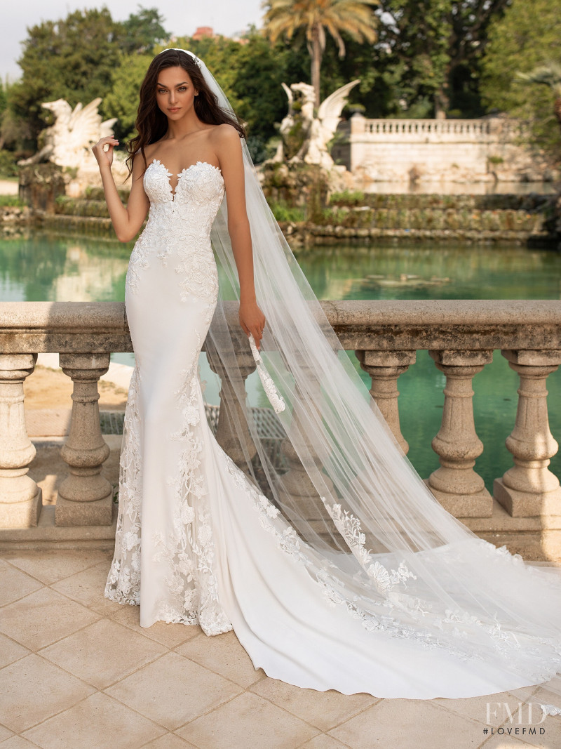 Zhenya Katava featured in  the Pronovias catalogue for Summer 2019