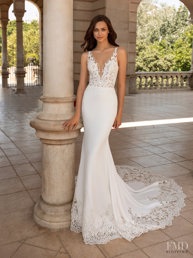 Zhenya Katava featured in  the Pronovias catalogue for Summer 2019