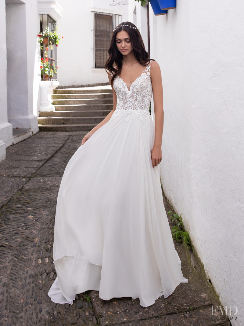 Zhenya Katava featured in  the Pronovias catalogue for Summer 2019