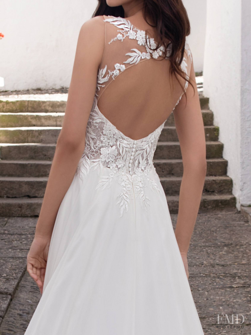 Zhenya Katava featured in  the Pronovias catalogue for Summer 2019