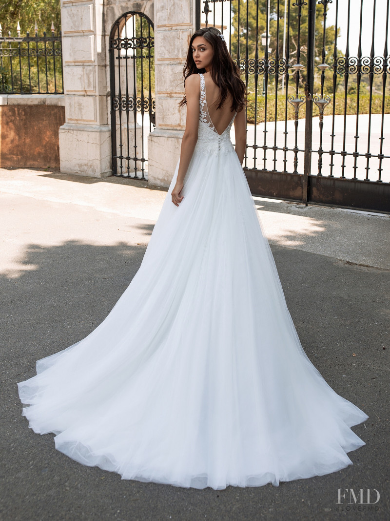 Zhenya Katava featured in  the Pronovias catalogue for Summer 2019