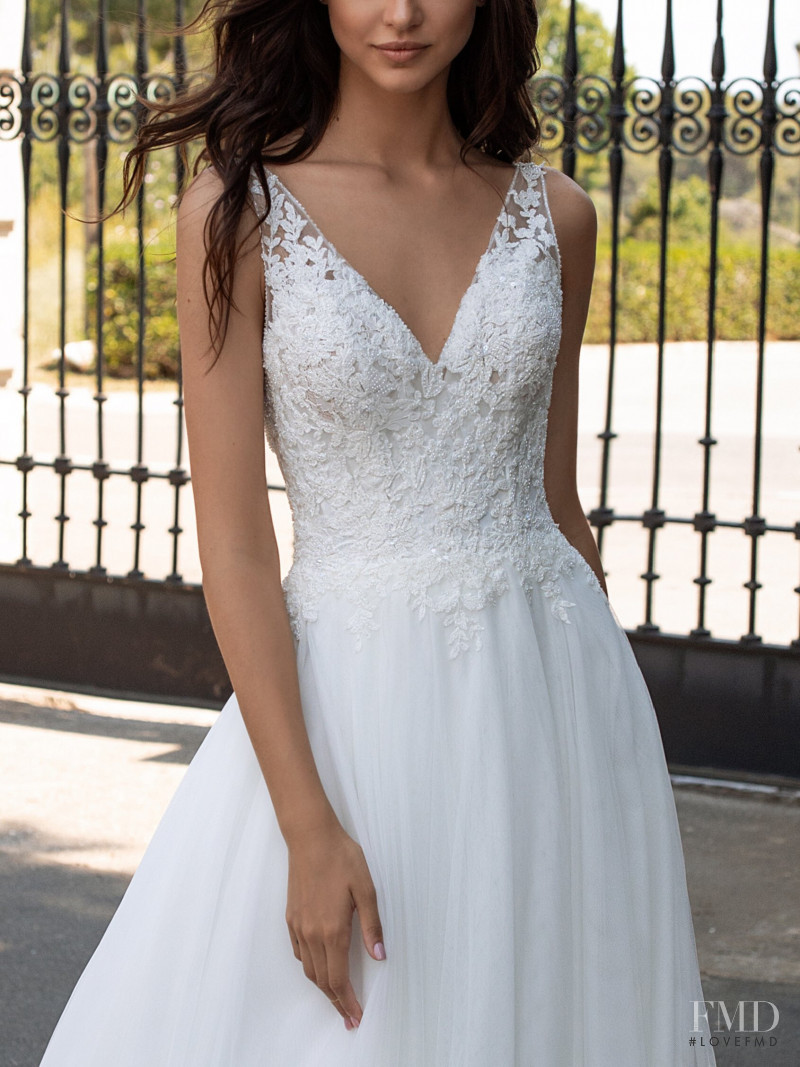 Zhenya Katava featured in  the Pronovias catalogue for Summer 2019