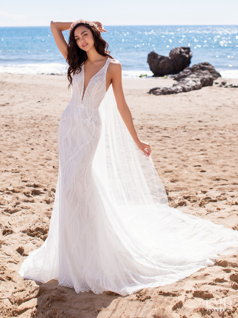 Zhenya Katava featured in  the Pronovias catalogue for Summer 2019