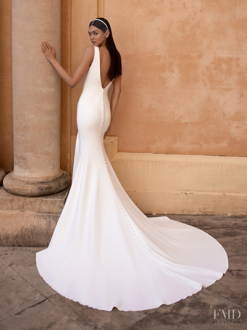 Zhenya Katava featured in  the Pronovias catalogue for Summer 2019