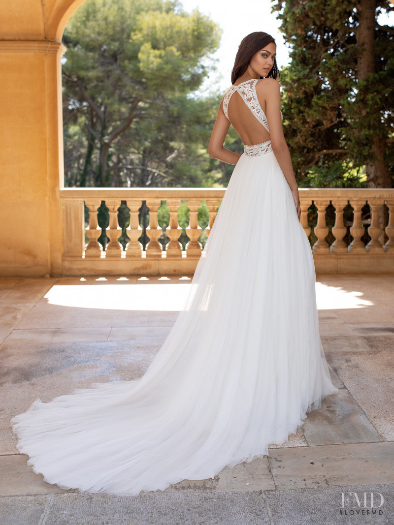 Zhenya Katava featured in  the Pronovias catalogue for Summer 2019