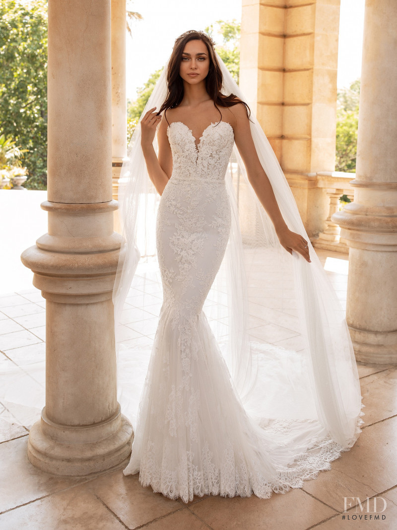 Zhenya Katava featured in  the Pronovias catalogue for Summer 2019